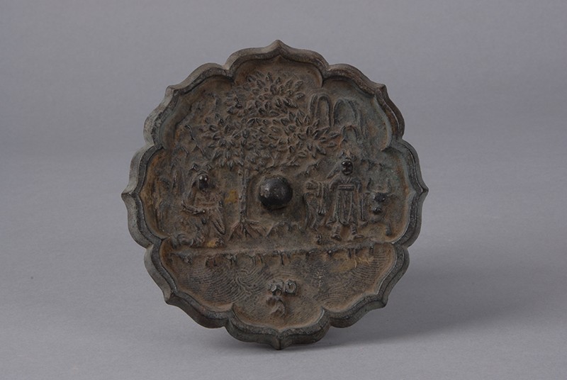 宋宁戚贩牛八瓣菱花形铜镜